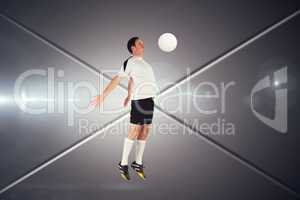 Composite image of football player in white jumping