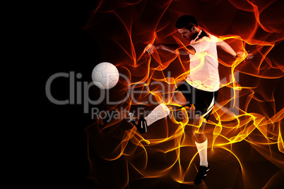 Composite image of football player in white kicking