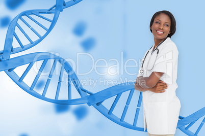 Composite image of young nurse with arms crossed
