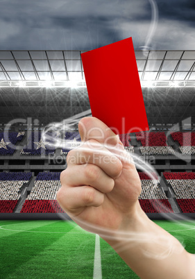 Composite image of hand holding up red card