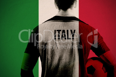 Composite image of italy football player holding ball