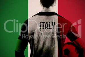 Composite image of italy football player holding ball