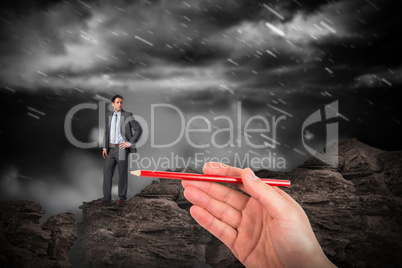 Composite image of hand drawing businessman