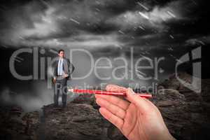 Composite image of hand drawing businessman