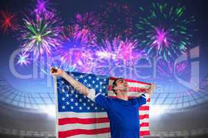 Composite image of american soccer fan holding flag