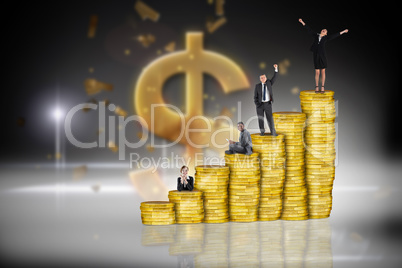 Composite image of business people on pile of coins