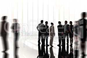 Composite image of business colleagues standing