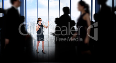 Composite image of business people walking in a blur