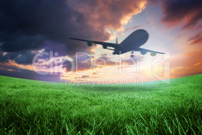 Composite image of airplane taking off