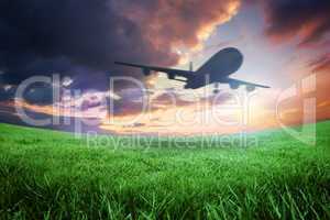 Composite image of airplane taking off