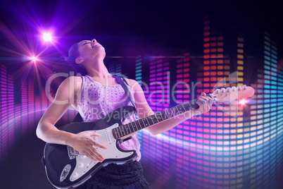 Composite image of pretty girl playing guitar