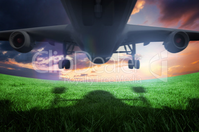 Composite image of airplane taking off