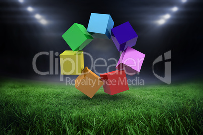 Composite image of 3d colourful cubes in a circle