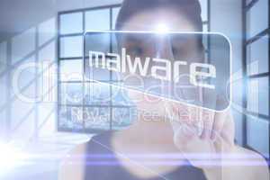 Businesswoman pointing to word malware