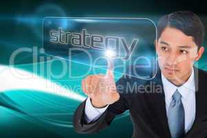 Businessman pointing to word strategy