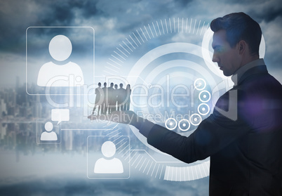 Composite image of business team looking at camera Composite image of business team looking at camera