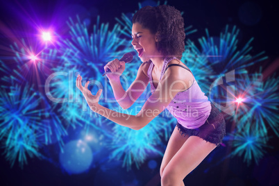 Composite image of pretty girl singing