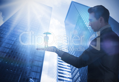Composite image of businessman holding business man holding umbr