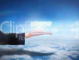 Businesswomans hand presenting the word authorship