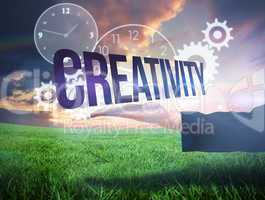 Businesswomans hand presenting the word creativity