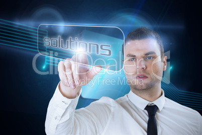 Businessman pointing to word solutions