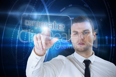 Businessman pointing to word corporate