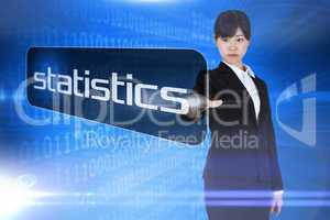 Businesswoman pointing to word statistics