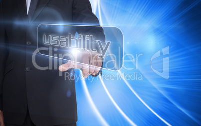Businessman pointing to word usability