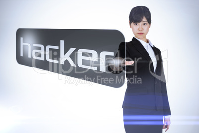 Businesswoman pointing to word hacker