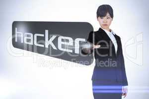 Businesswoman pointing to word hacker