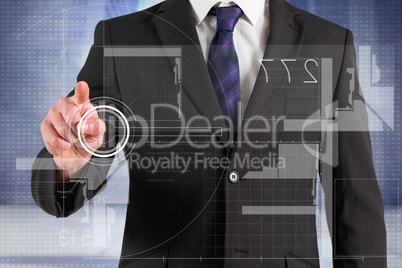 Composite image of businessman in suit pointing finger at interf