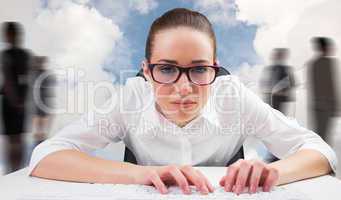 Composite image of businesswoman typing on a keyboard