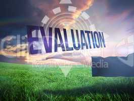 Businesswomans hand presenting the word evaluation