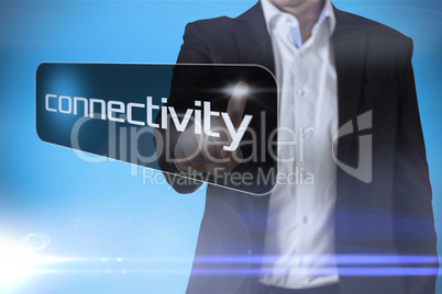 Businessman pointing to word connectivity