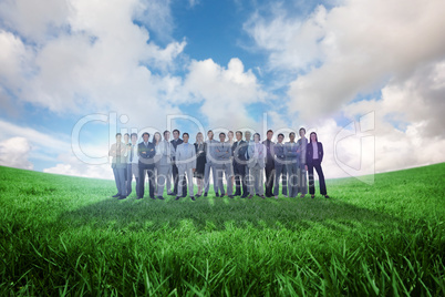Composite image of business people standing up