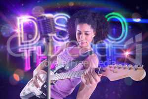 Composite image of pretty girl playing guitar