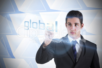 Businessman pointing to word global