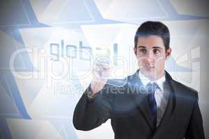 Businessman pointing to word global