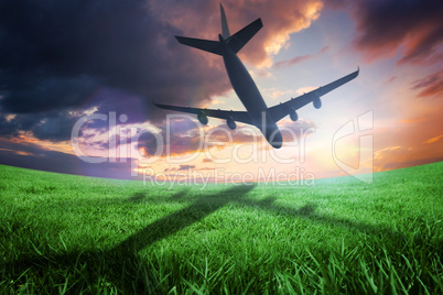 Composite image of airplane taking off