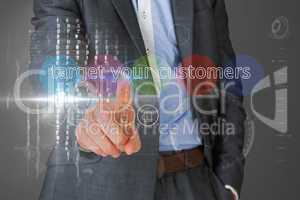Businessman touching the words target your customers on interfac