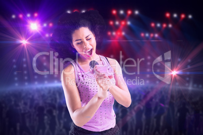 Composite image of pretty girl singing