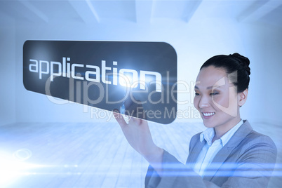 Businesswoman pointing to word application
