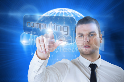 Businessman pointing to word computing