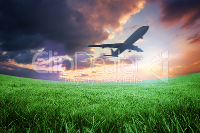 Composite image of airplane taking off