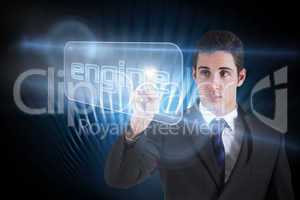 Businessman pointing to word engine