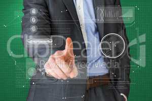 Composite image of businessman in grey suit pointing at interfac