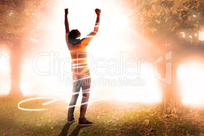 Composite image of cheering football fan