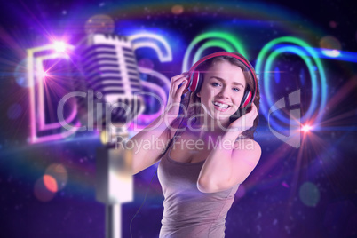 Composite image of pretty girl listening to music