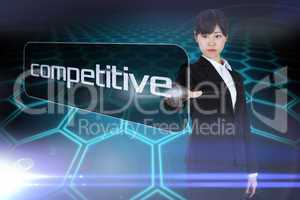 Businesswoman pointing to word competitive