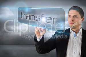 Businessman pointing to word transfer